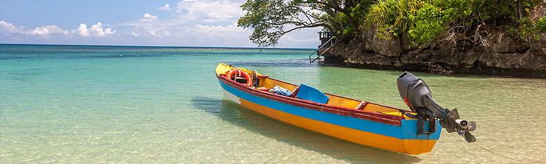 Boat anchored on Jamaica beach