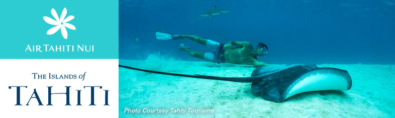 Man swimming with stingrays